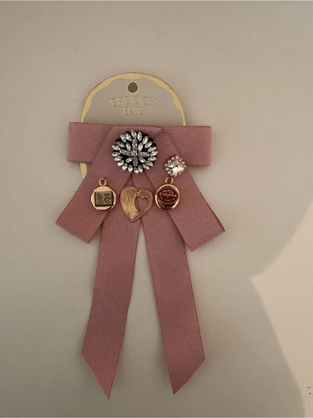 Anthropologie Dusty Rose Ribbon Brooch with Crystal and Gold Charms NWT